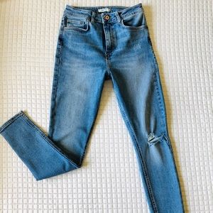 Distressed Light Wash High Rise Jeans